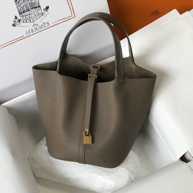 H**mes shopping bags